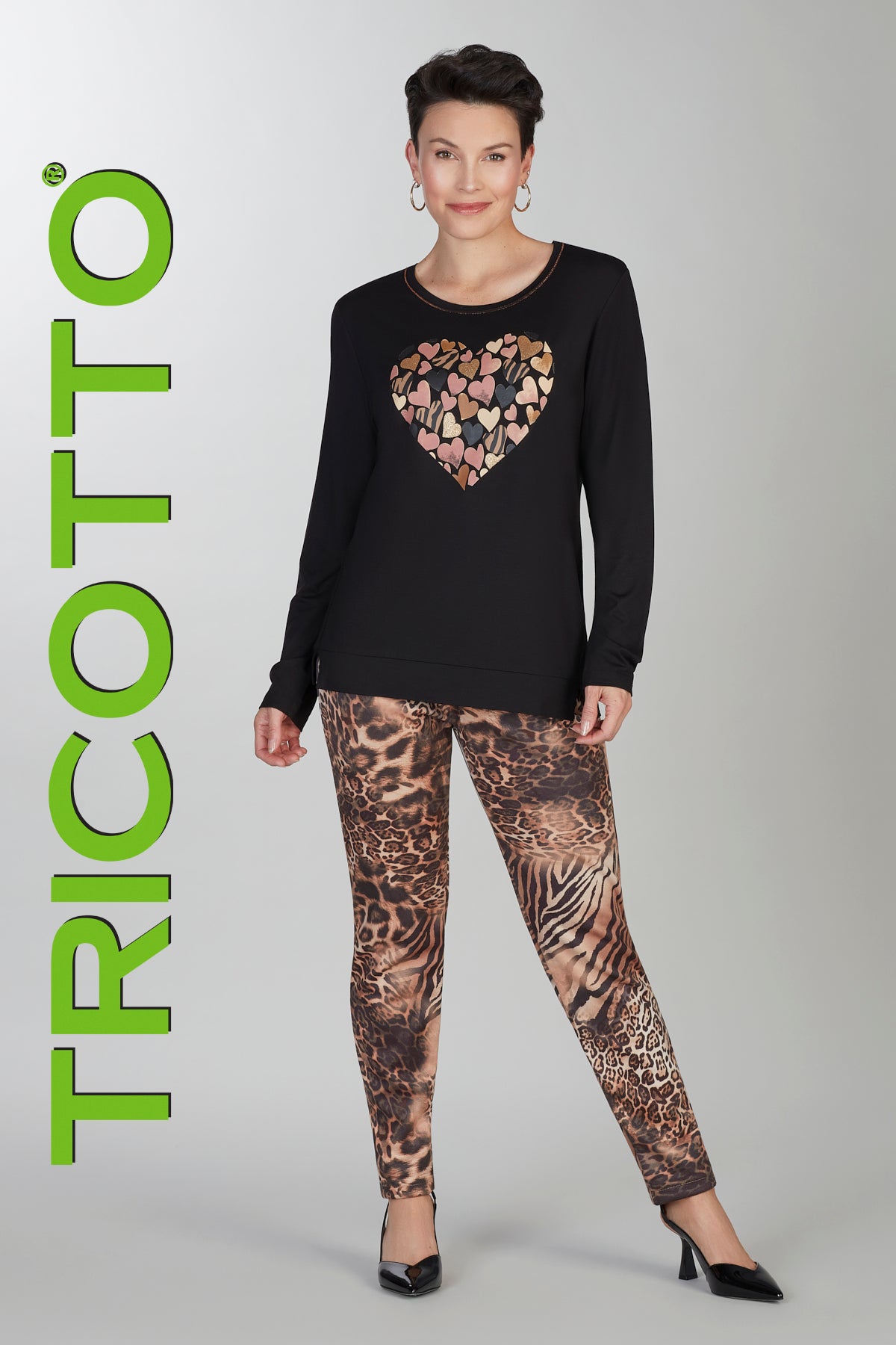 Black long sleeve top with front heart sequin detail