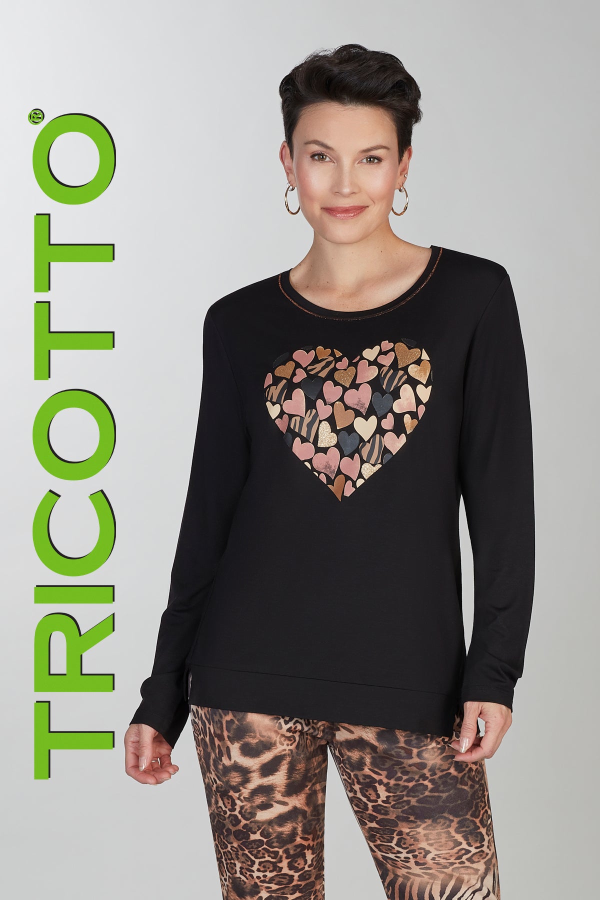 Black long sleeve top with front heart sequin detail
