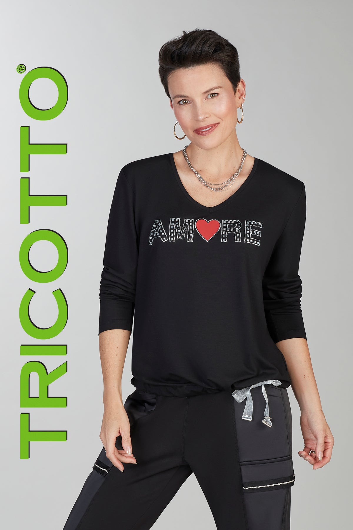 Tricotto black sweater with sequin amore print on front