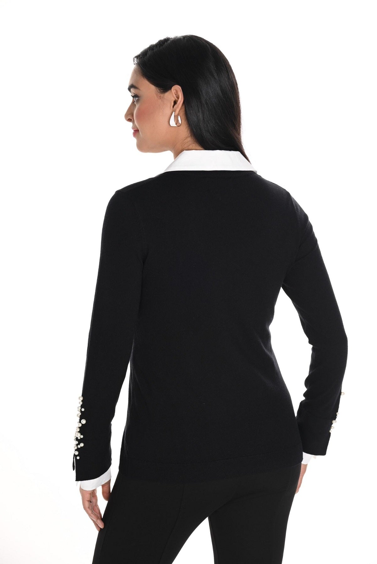 Frank Lyman Fooler Black white sweater with white pearl cuff detail